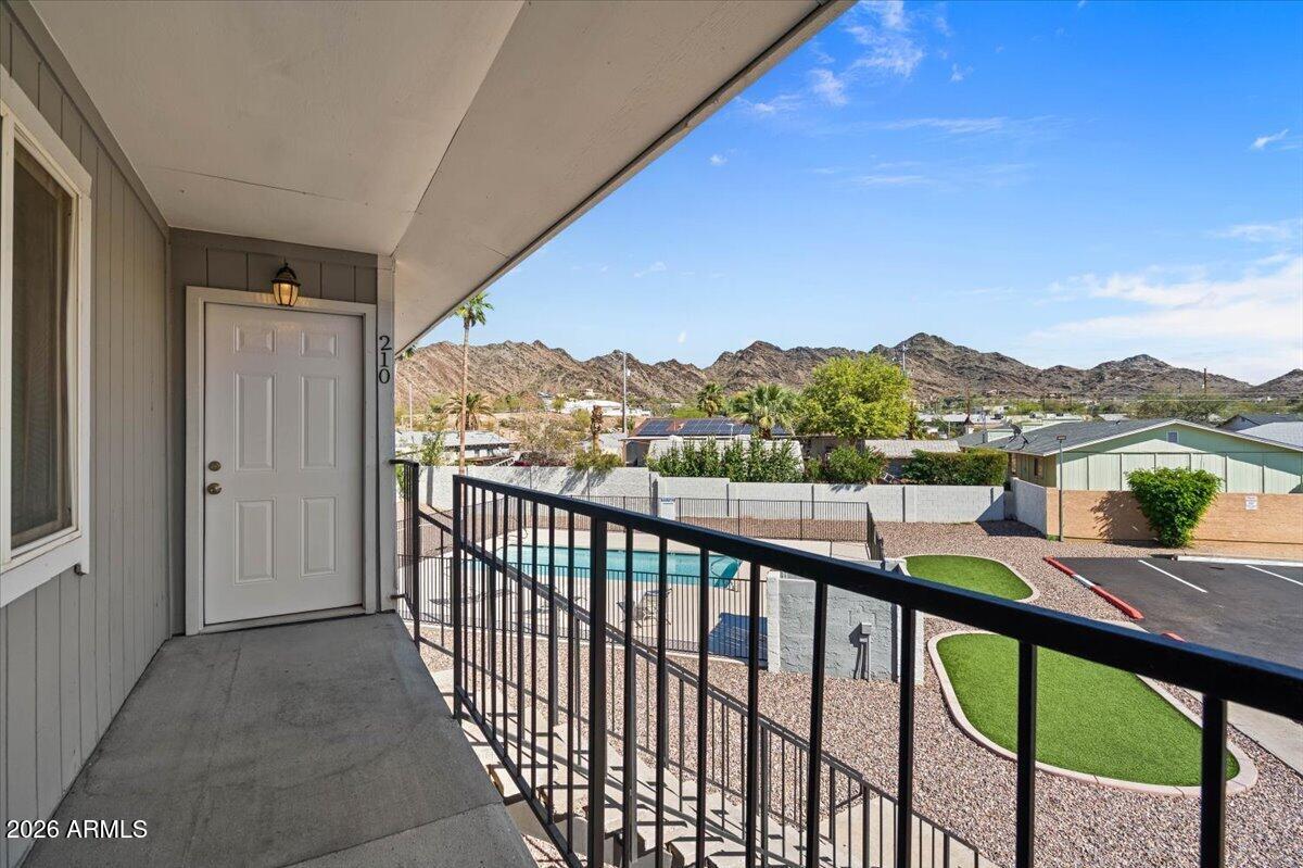 1346 East Mountain View Road, Unit 209 Phoenix, AZ 85020 - Photo 6 of 31 a view of a city from a balcony