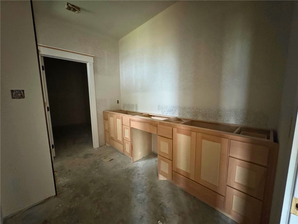 162 Buffalo Rdg Road Giddings, TX 78942 - Photo 9 of 13 a view of cabinets and wooden floor