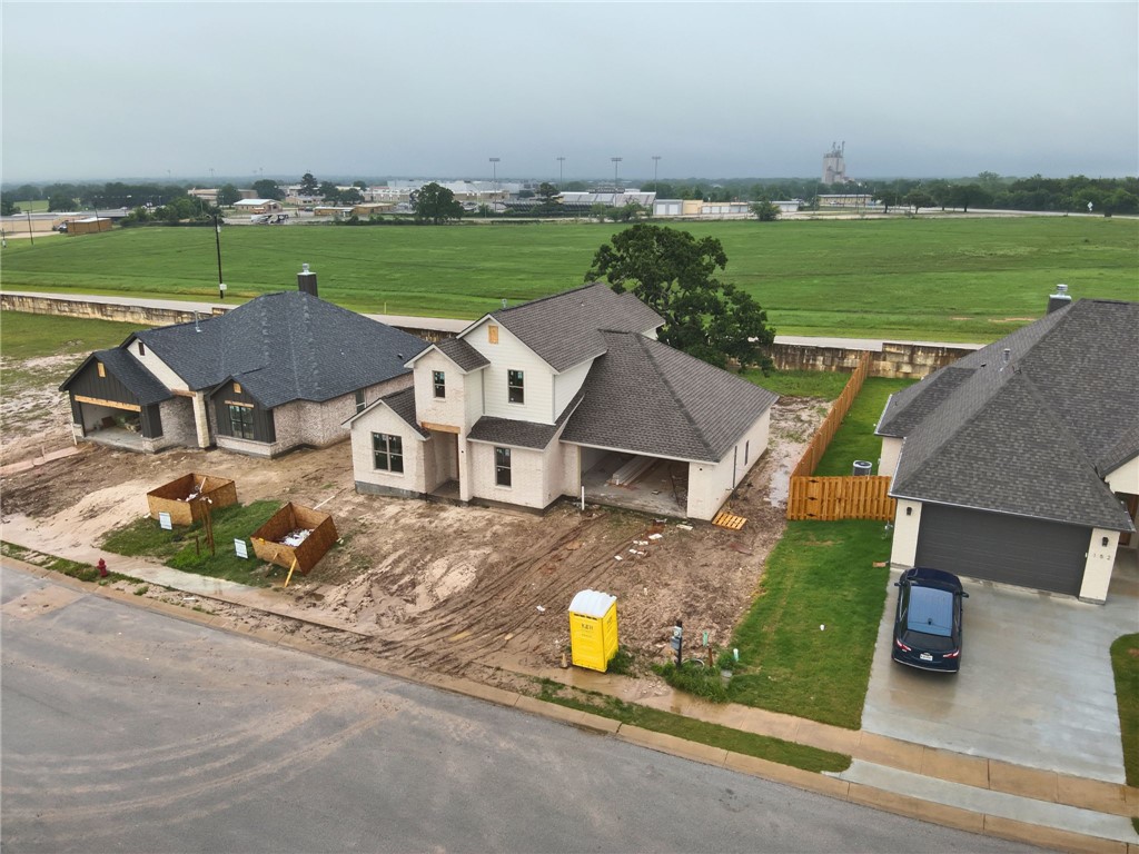 162 Buffalo Rdg Road Giddings, TX 78942 - Photo 10 of 13 an aerial view of a house with a garden and lake view
