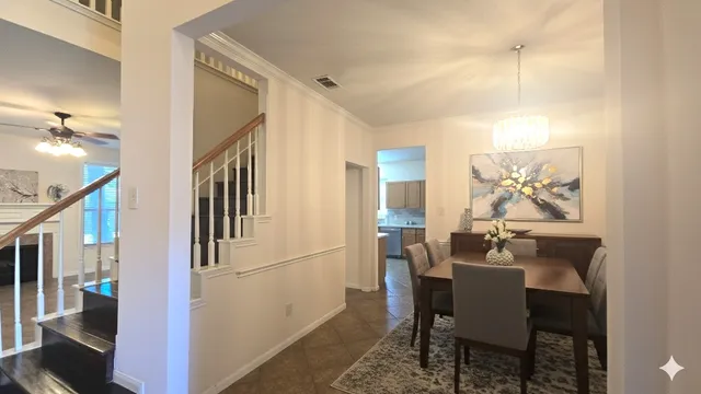 a view of a livingroom with furniture and window