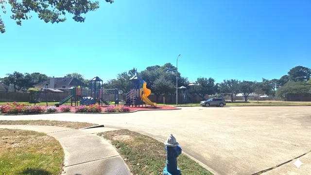 a view of a swimming pool with an ocean view