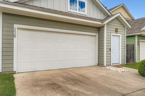a view of outdoor space garage and window
