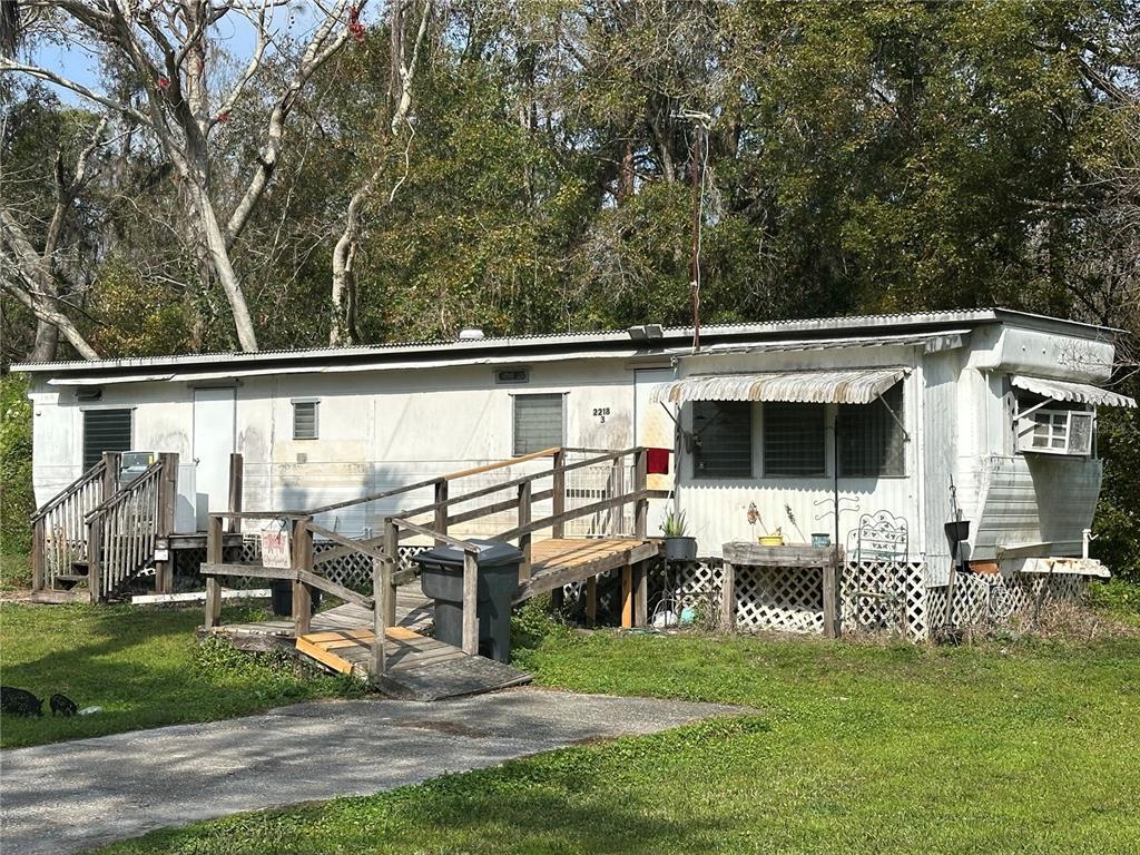 2218 Ellie Road, Unit 1 Auburndale, FL 33823 - Photo 15 of 21 a view of a house with a yard