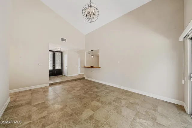 a view of cabinets and window