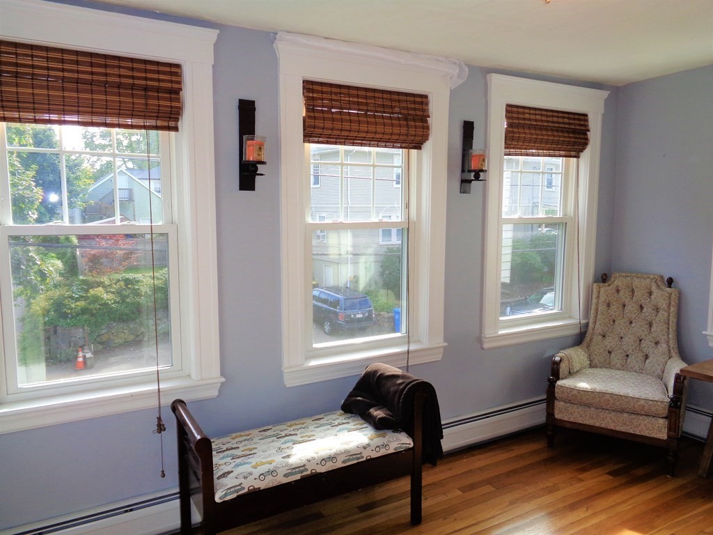35 Cambria Road, Unit 2 Waltham, MA 02453 - Photo 8 of 23 a living room with furniture and a window