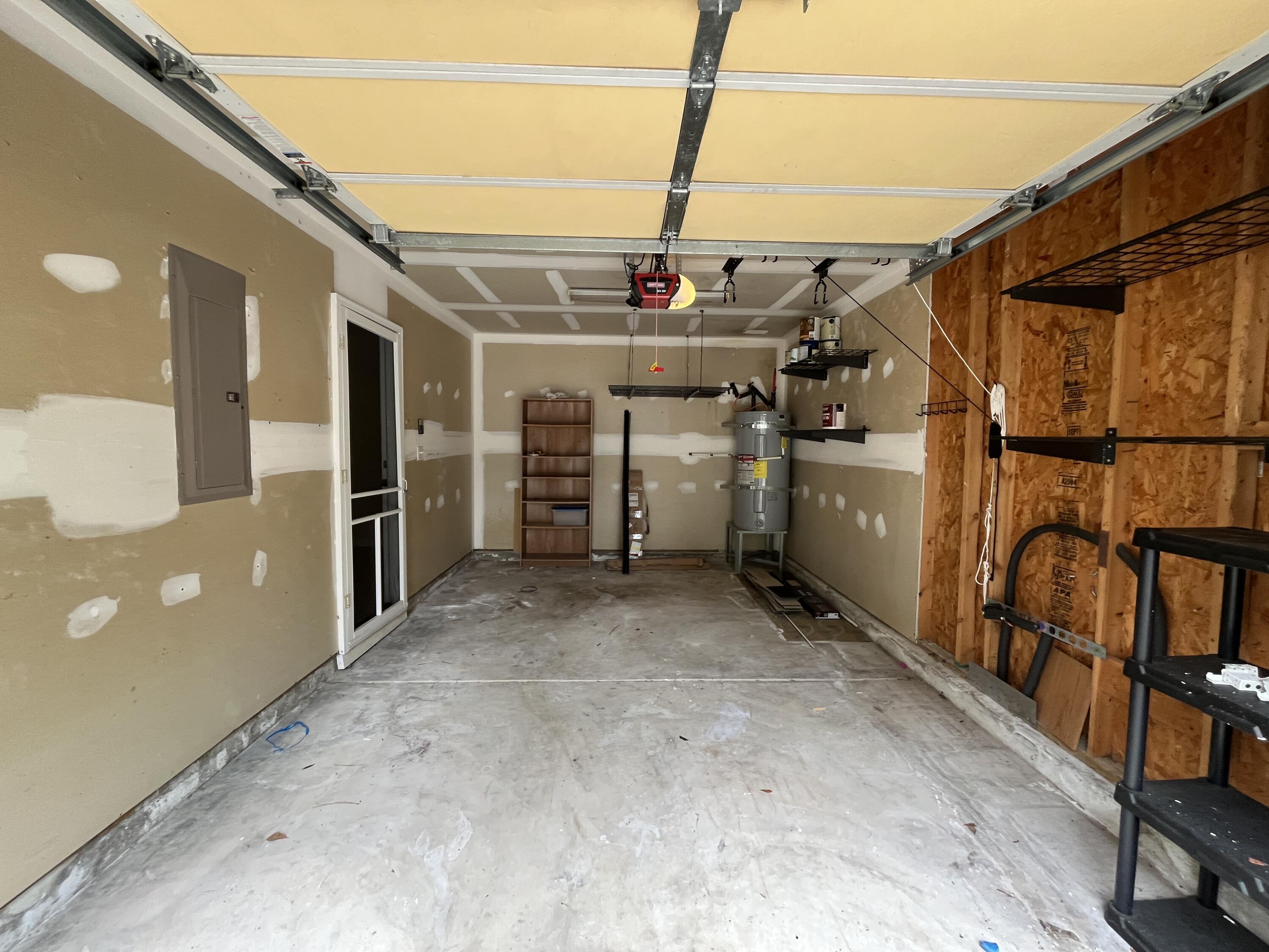 4840 Oak Leaf Road Summerville, SC 29485 - Photo 35 of 38 Garage with opener and storage