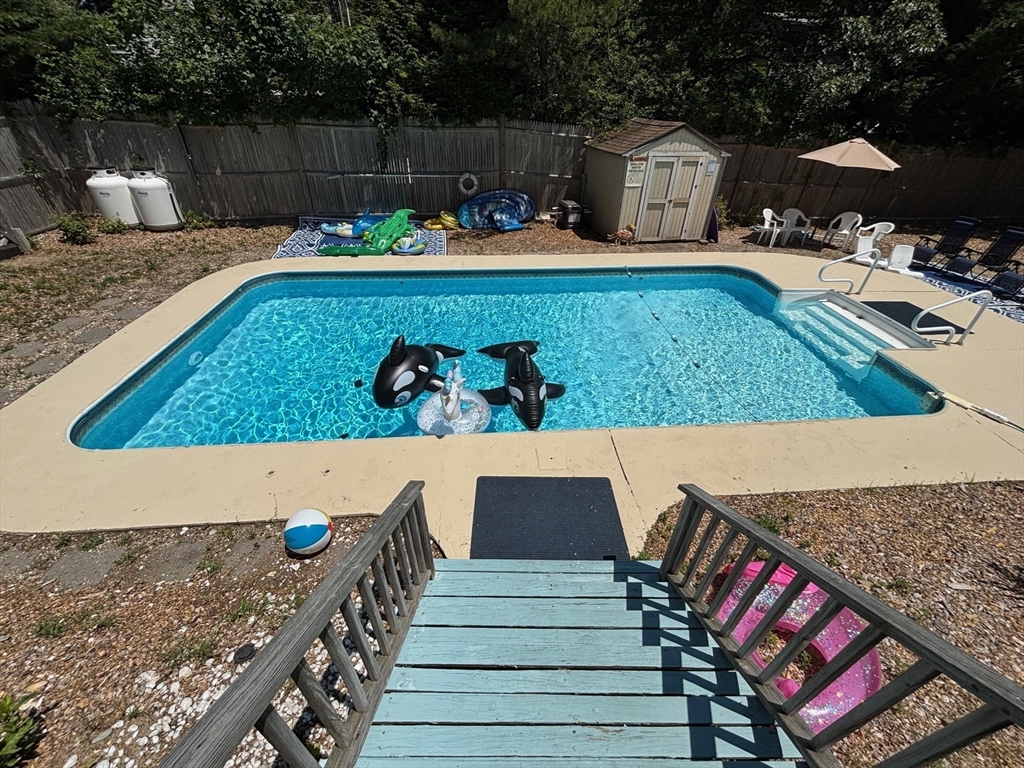 35 Tecumseh Road Wellfleet, MA 02667 - Photo 4 of 24 a view of swimming pool with outdoor seating