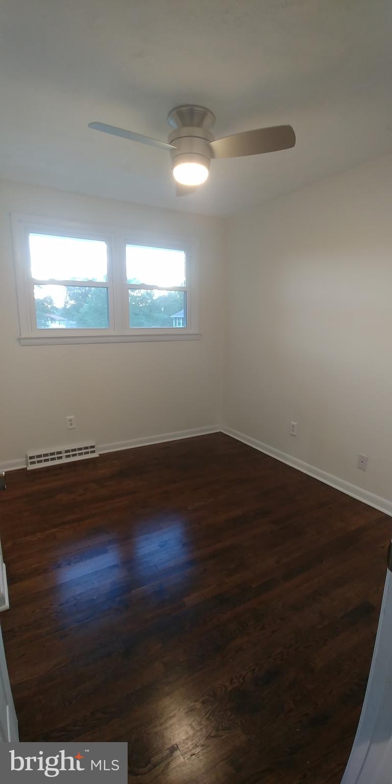 6750 Amherst Road Bryans Road, MD 20616 - Photo 15 of 15 a view of empty room with wooden floor