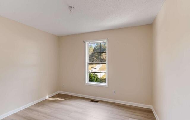 139 Clover Court Temple, GA 30179 - Photo 13 of 32 an empty room with a window