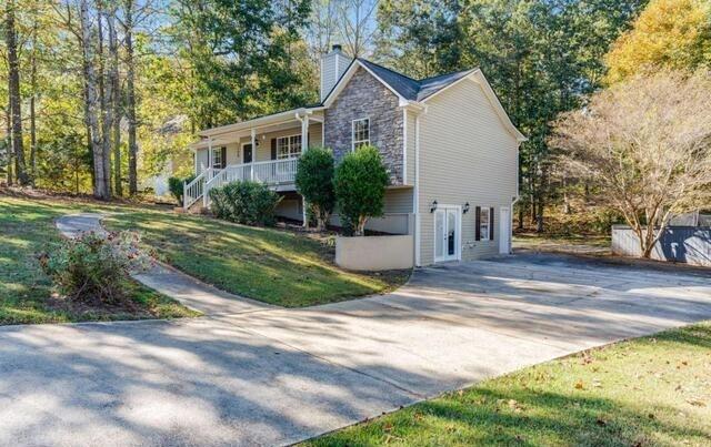 139 Clover Court Temple, GA 30179 - Photo 3 of 32 a view of a house with yard and plants