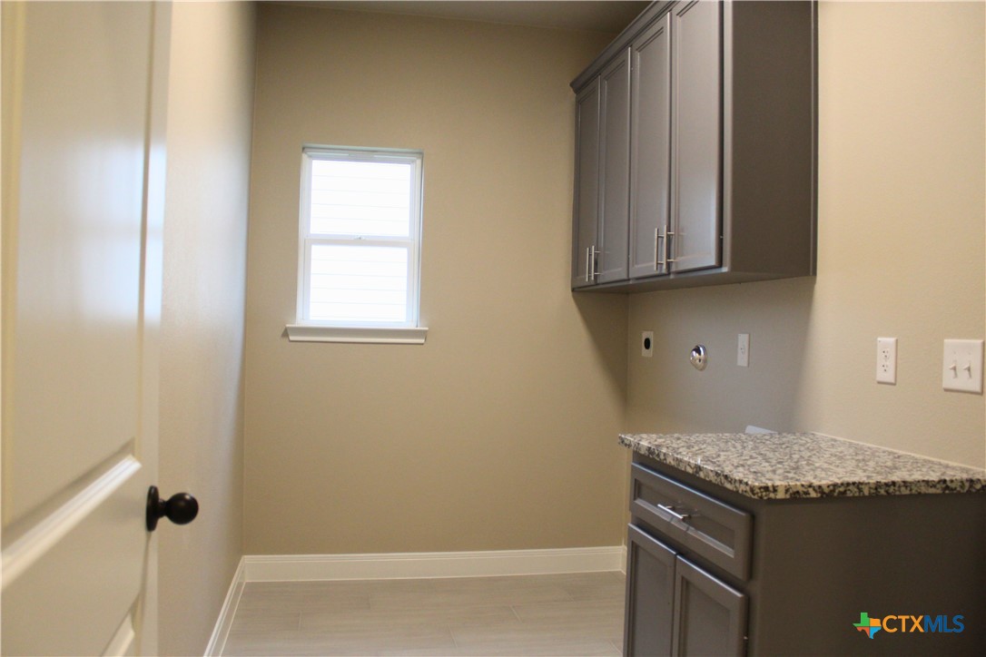3824 Keller Road Temple, TX 76504 - Photo 13 of 22 a view of a kitchen and utility room