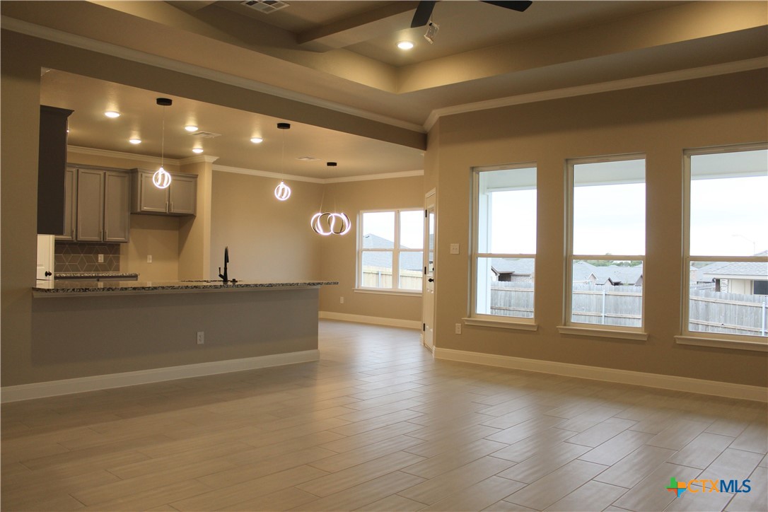 3824 Keller Road Temple, TX 76504 - Photo 3 of 22 a view of empty room with wooden floor and fan