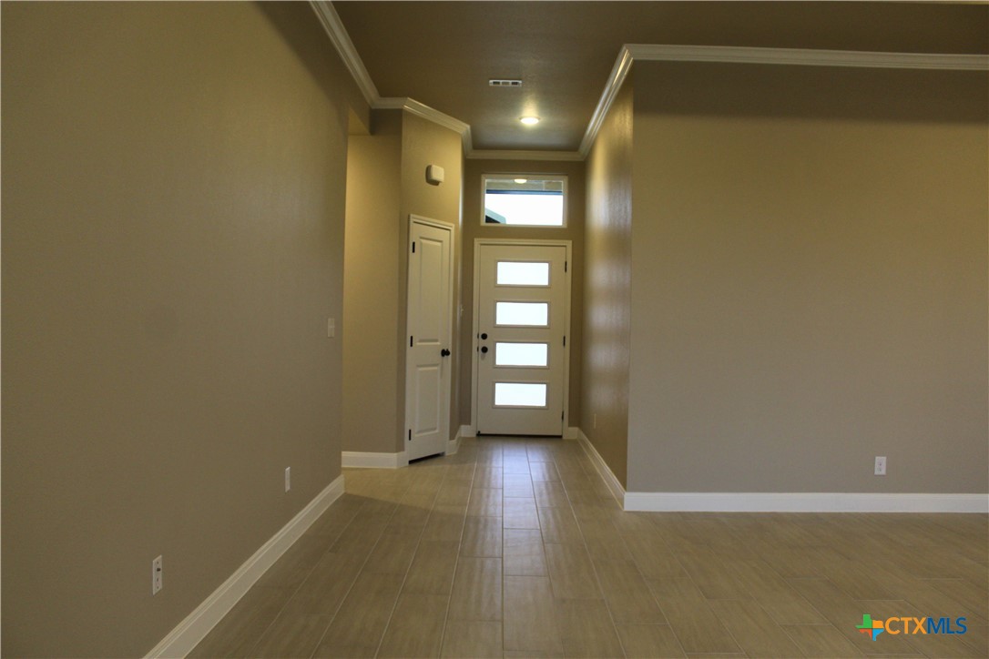 3824 Keller Road Temple, TX 76504 - Photo 9 of 22 a view of wooden floor and windows in a room