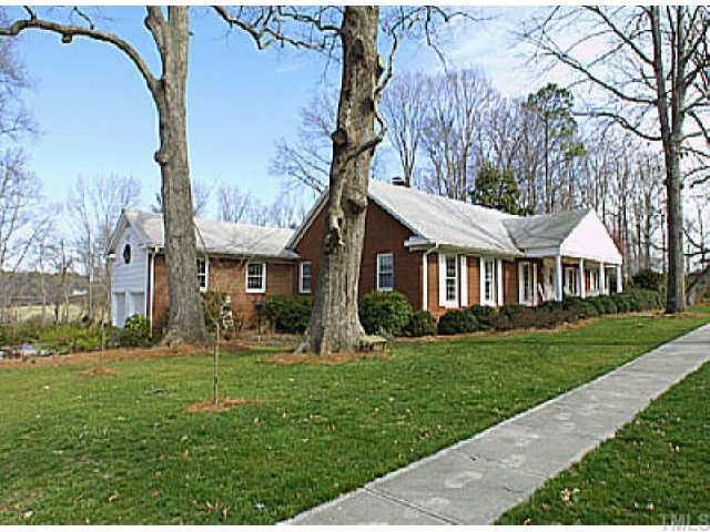 6214 Arrington Road Raleigh, NC 27607 - Photo 1 of 1 a view of a house with a yard