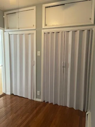 a view of stairs with wooden floor