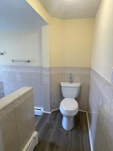 a bathroom with a toilet and a sink
