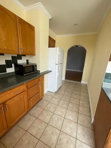 a bathroom with a sink a mirror and a bathtub