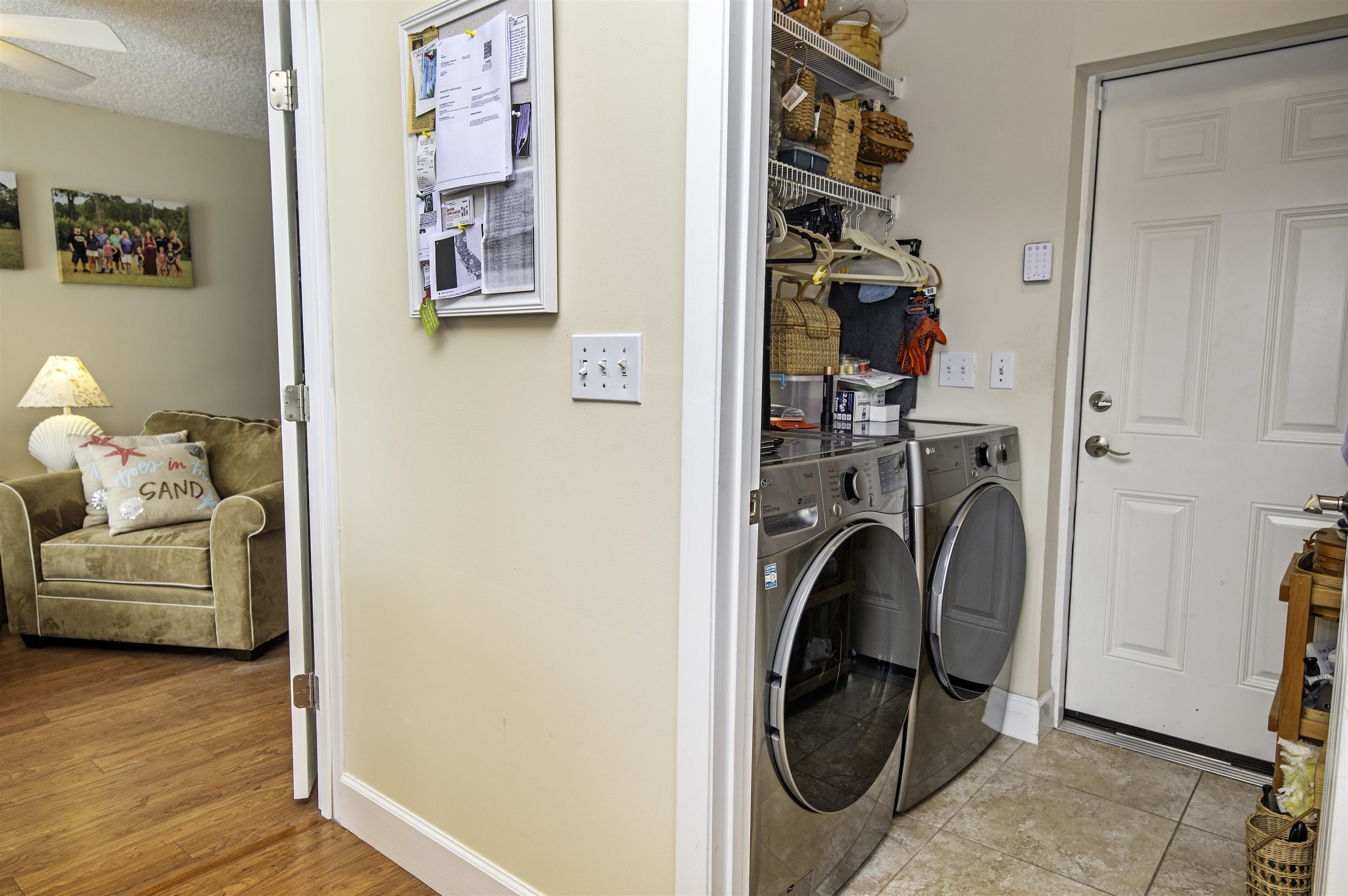 253 Treasure Beach Road St. Augustine, FL 32080 - Photo 24 of 52 a storage room with washer and dryer