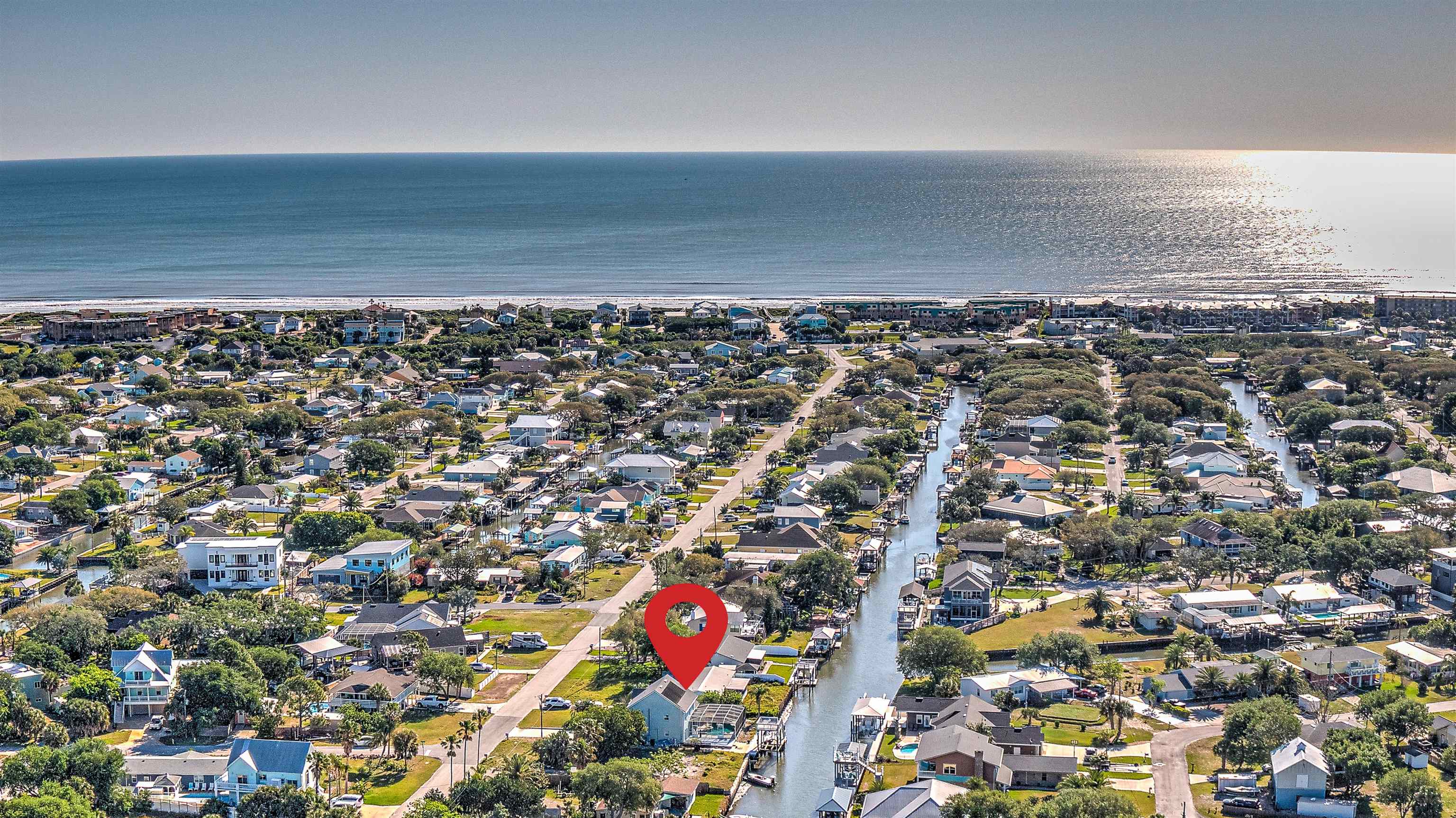 253 Treasure Beach Road St. Augustine, FL 32080 - Photo 3 of 52 an aerial view of a city