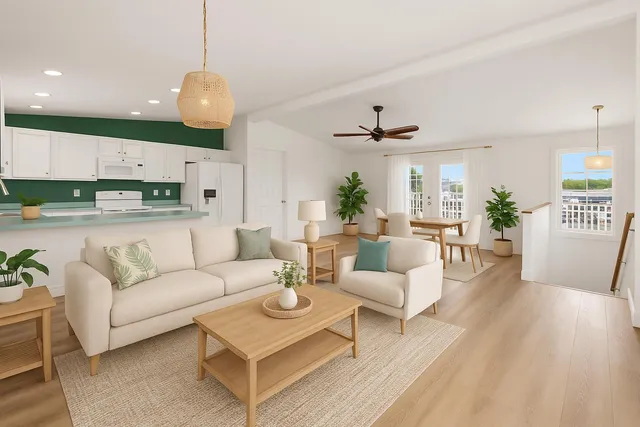 a bedroom with a bed chandelier and a window