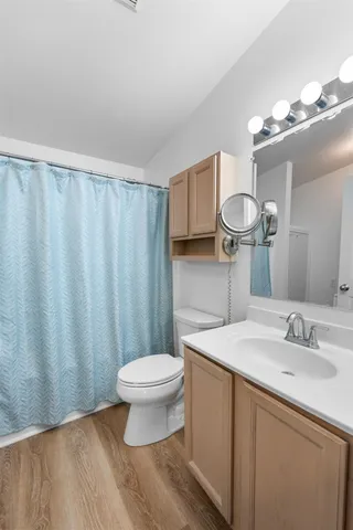 a view of a swimming pool with a lounge chairs