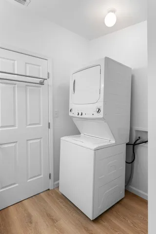 a view of a lake with couches and city view