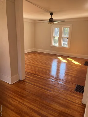 a bathroom with a sink toilet and a mirror