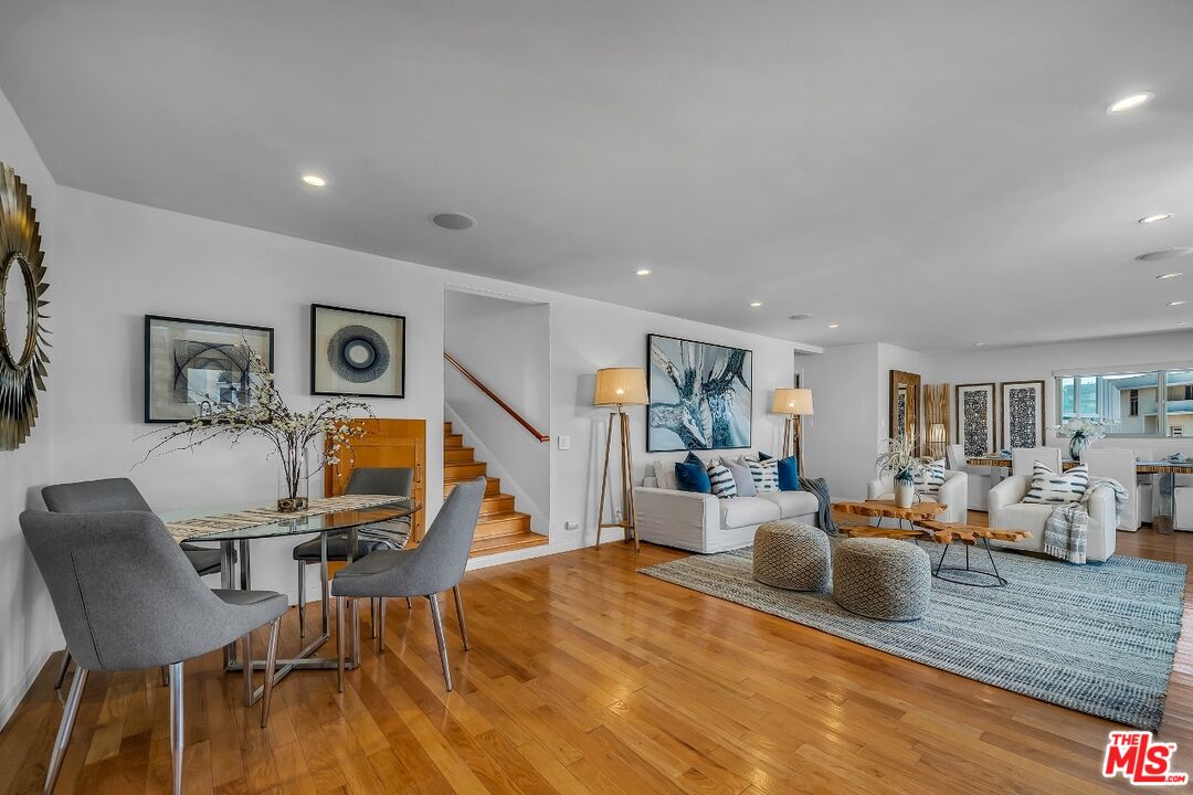7328 Vista Del Mar Lane Playa del Rey, CA 90293 - Photo 14 of 56 a living room with furniture and wooden floor
