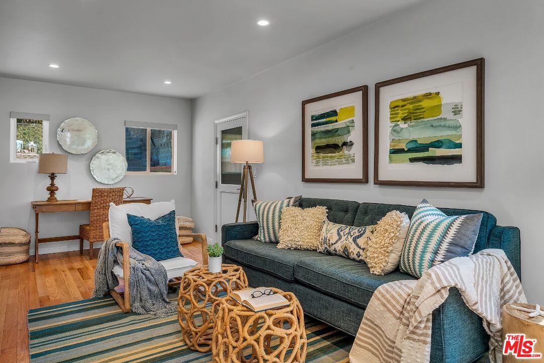 7328 Vista Del Mar Lane Playa del Rey, CA 90293 - Photo 23 of 56 a living room with furniture and a large window