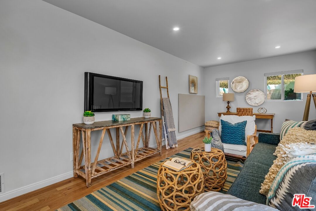 7328 Vista Del Mar Lane Playa del Rey, CA 90293 - Photo 25 of 56 a living room with furniture and a flat screen tv