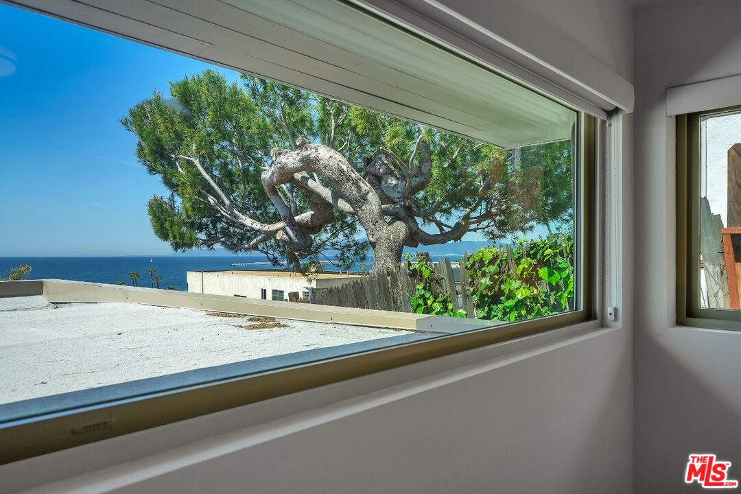 7328 Vista Del Mar Lane Playa del Rey, CA 90293 - Photo 28 of 56 a view of a living room and a window