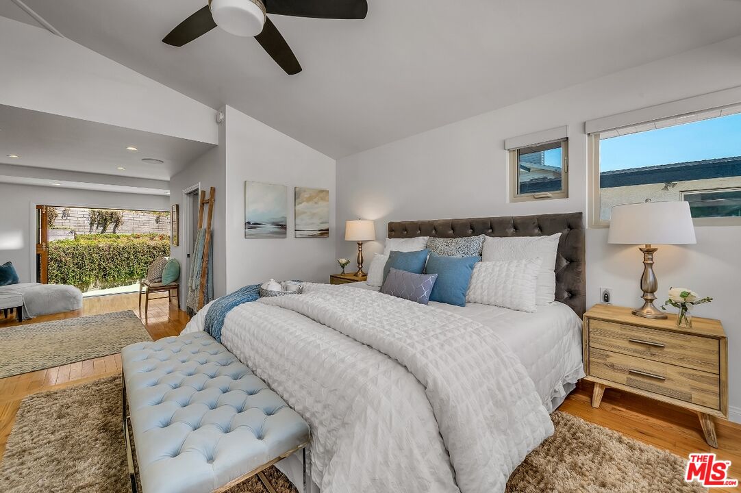7328 Vista Del Mar Lane Playa del Rey, CA 90293 - Photo 37 of 56 a bedroom with a large bed and a window