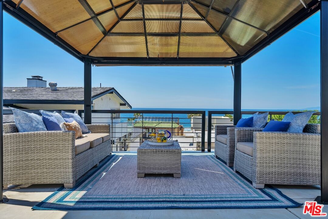 7328 Vista Del Mar Lane Playa del Rey, CA 90293 - Photo 44 of 56 a living room with furniture and a potted plant