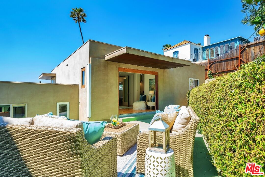 7328 Vista Del Mar Lane Playa del Rey, CA 90293 - Photo 50 of 56 a front view of a house with patio