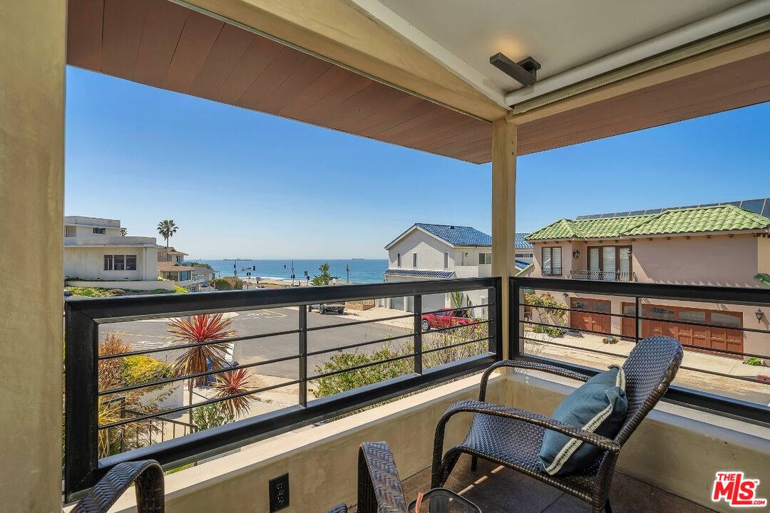 7328 Vista Del Mar Lane Playa del Rey, CA 90293 - Photo 8 of 56 a view of a chairs and table in the balcony
