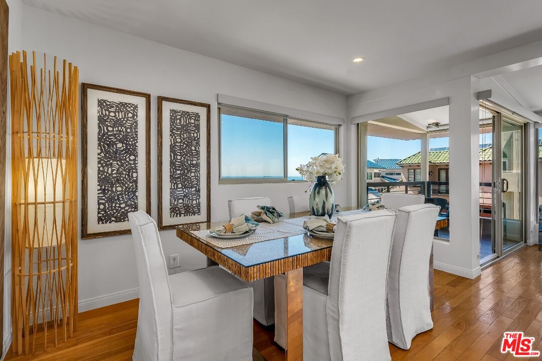 7328 Vista Del Mar Lane Playa del Rey, CA 90293 - Photo 9 of 56 a view of a dining room with furniture window and wooden floor