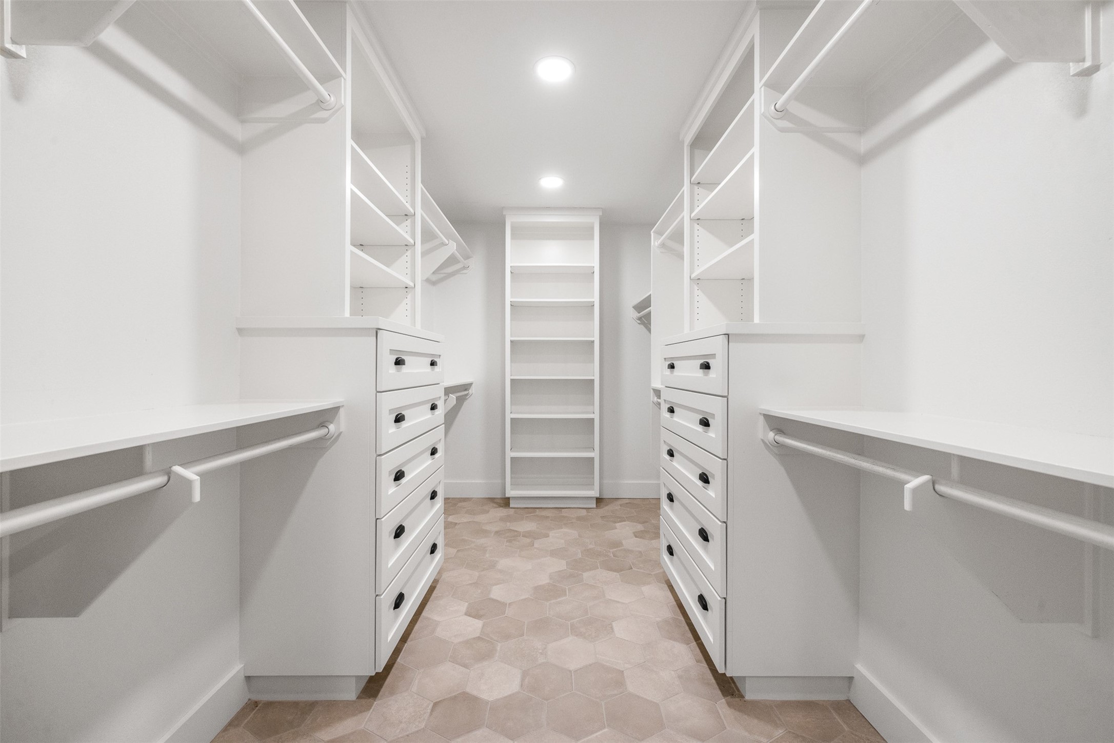 351 Pleasant Hill School Road Brenham, TX 77833 - Photo 15 of 46 a view of walk in closet with empty racks