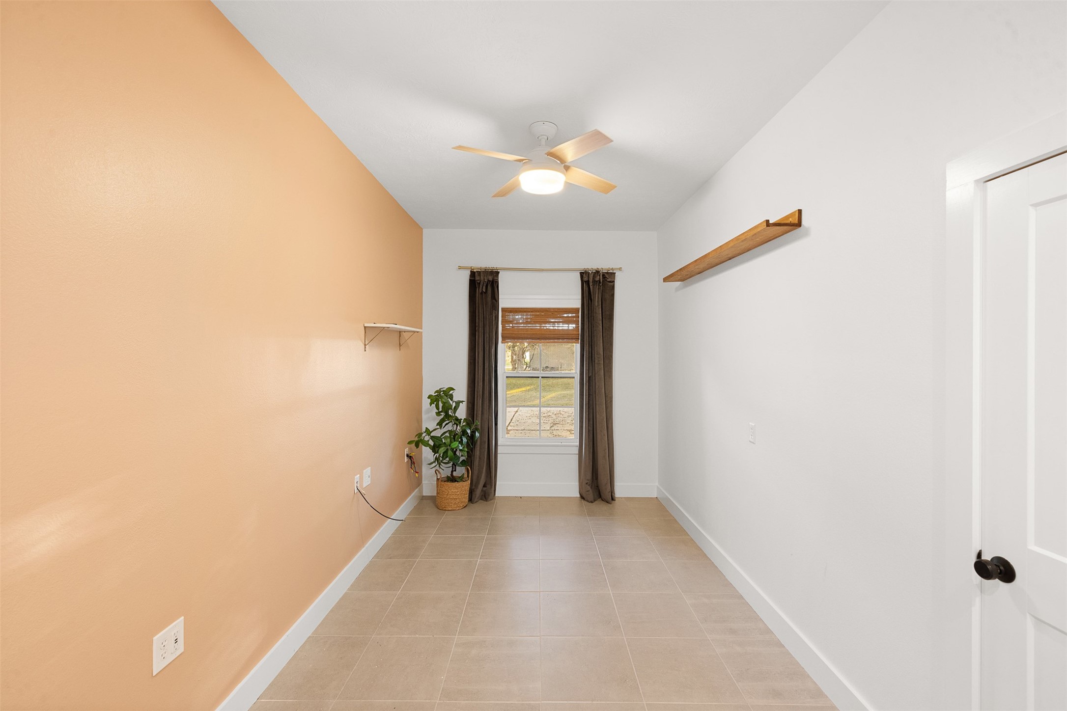 351 Pleasant Hill School Road Brenham, TX 77833 - Photo 19 of 46 a view of an empty room with a window