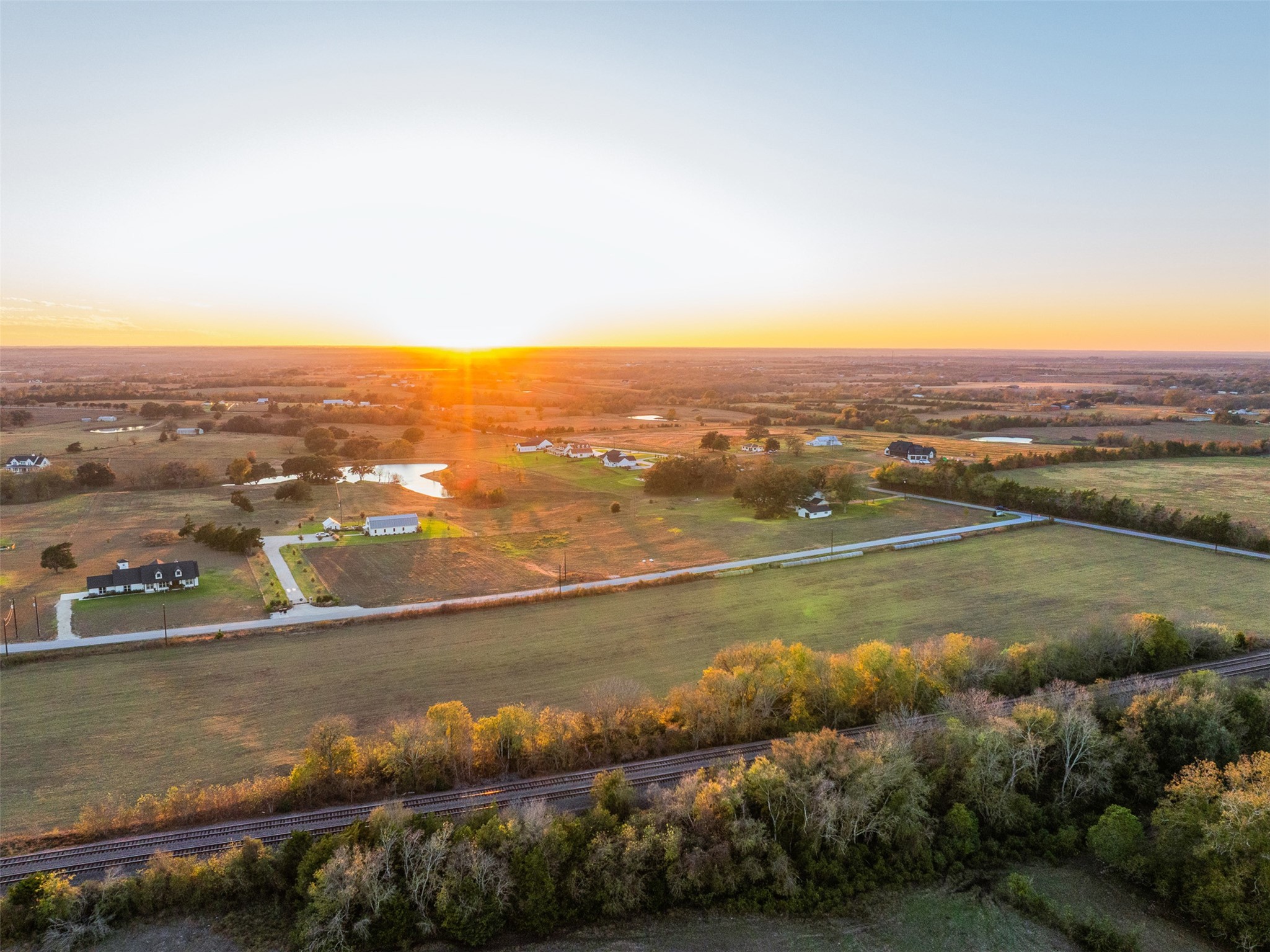 351 Pleasant Hill School Road Brenham, TX 77833 - Photo 2 of 46 an aerial view of residential houses with outdoor space