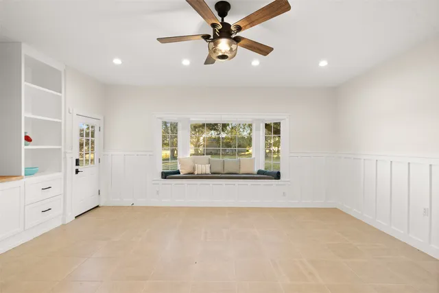 a kitchen with a sink and a refrigerator