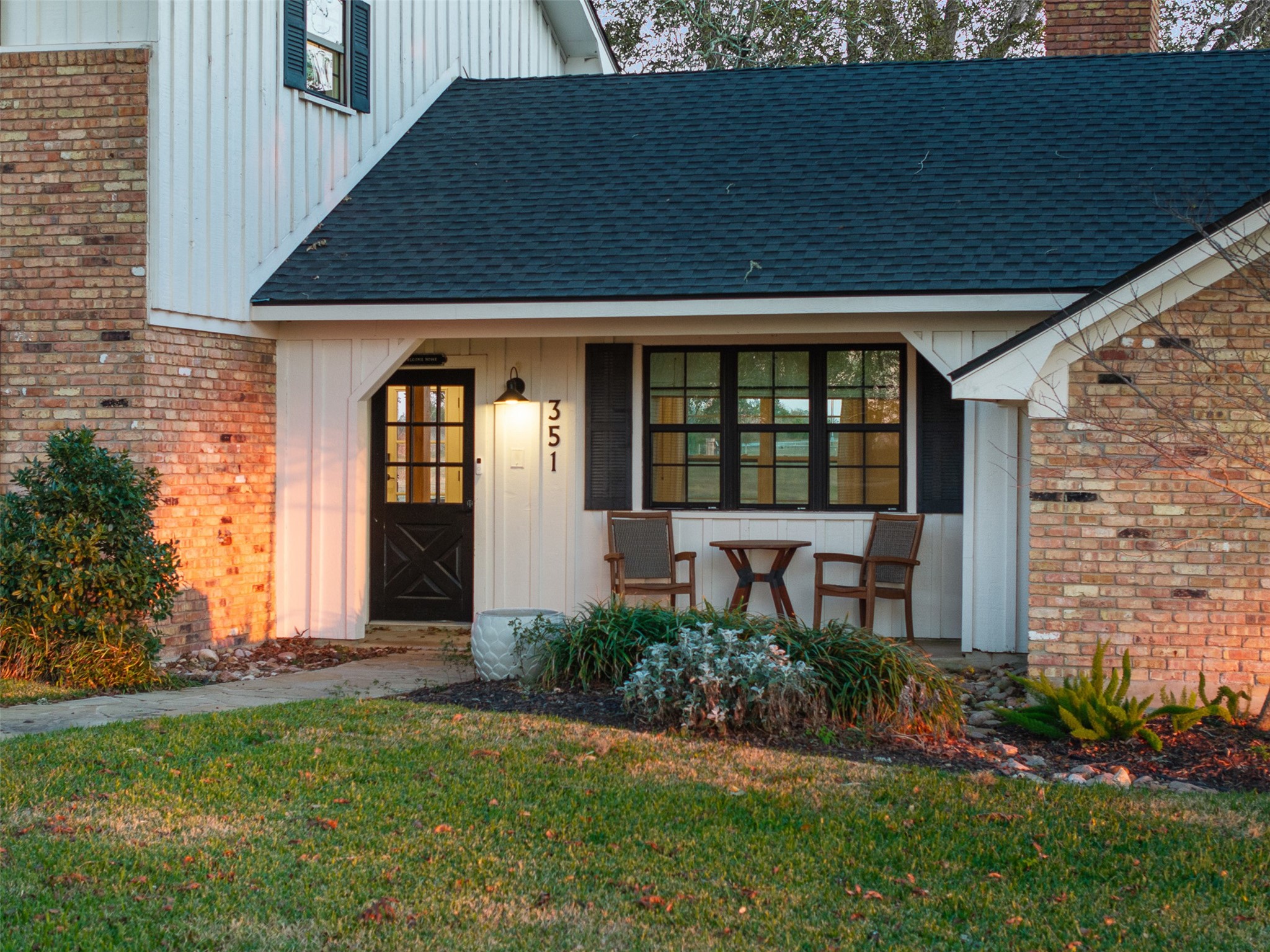 351 Pleasant Hill School Road Brenham, TX 77833 - Photo 3 of 46 a front view of a house with a yard