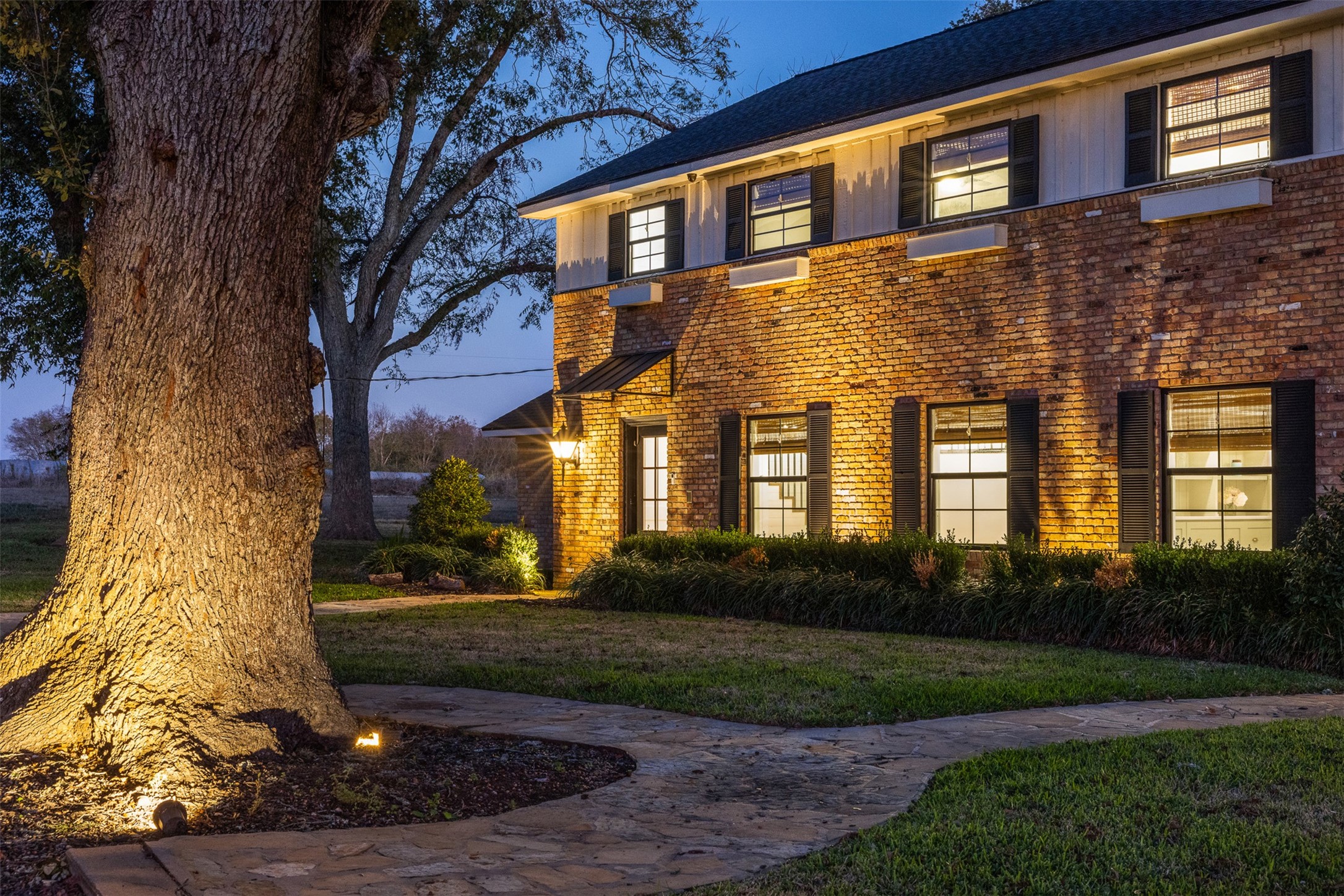 351 Pleasant Hill School Road Brenham, TX 77833 - Photo 43 of 46 a front view of a house with a yard