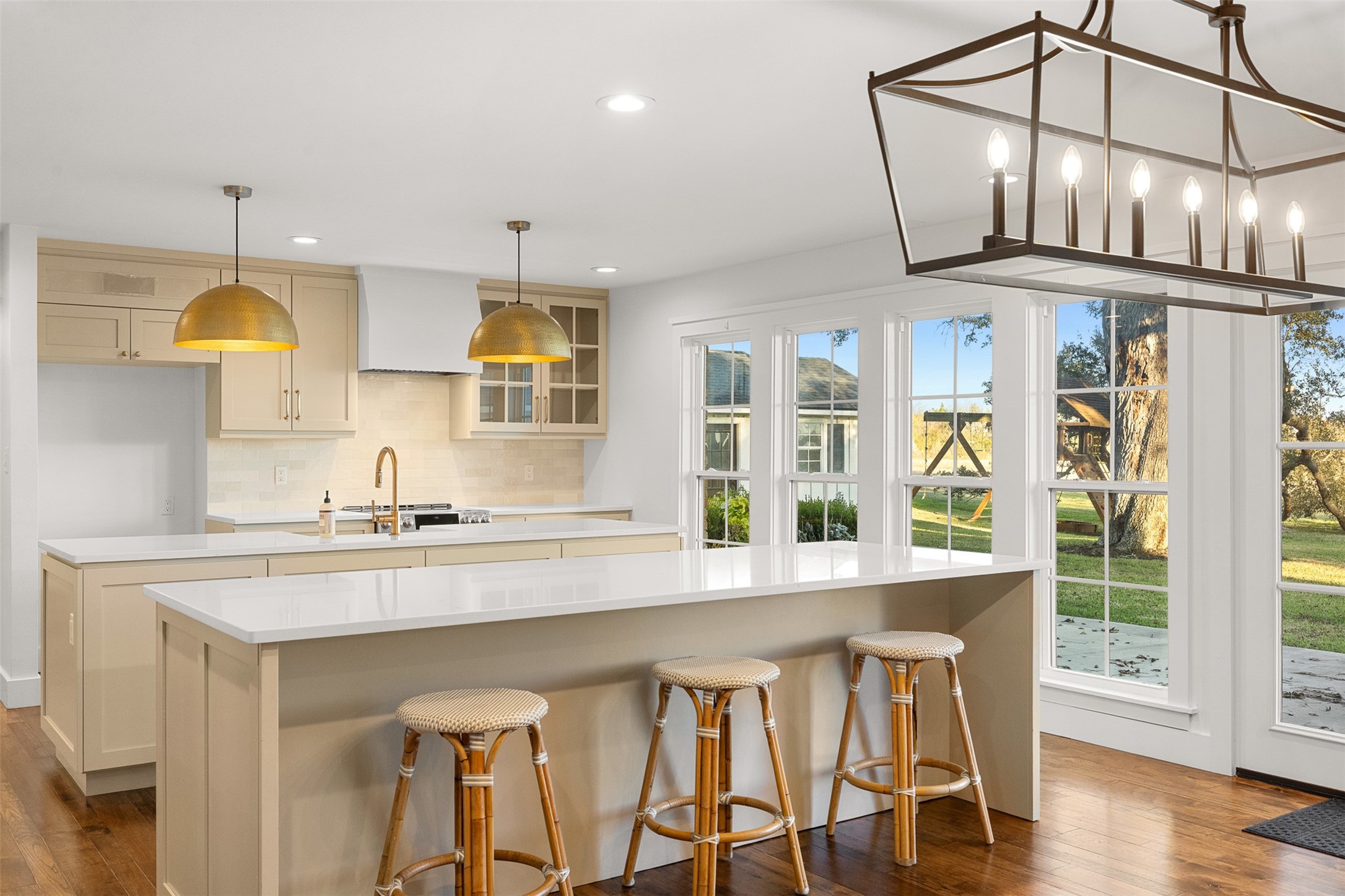 351 Pleasant Hill School Road Brenham, TX 77833 - Photo 7 of 46 a kitchen with stainless steel appliances granite countertop a stove a sink dishwasher and cabinets with wooden floor
