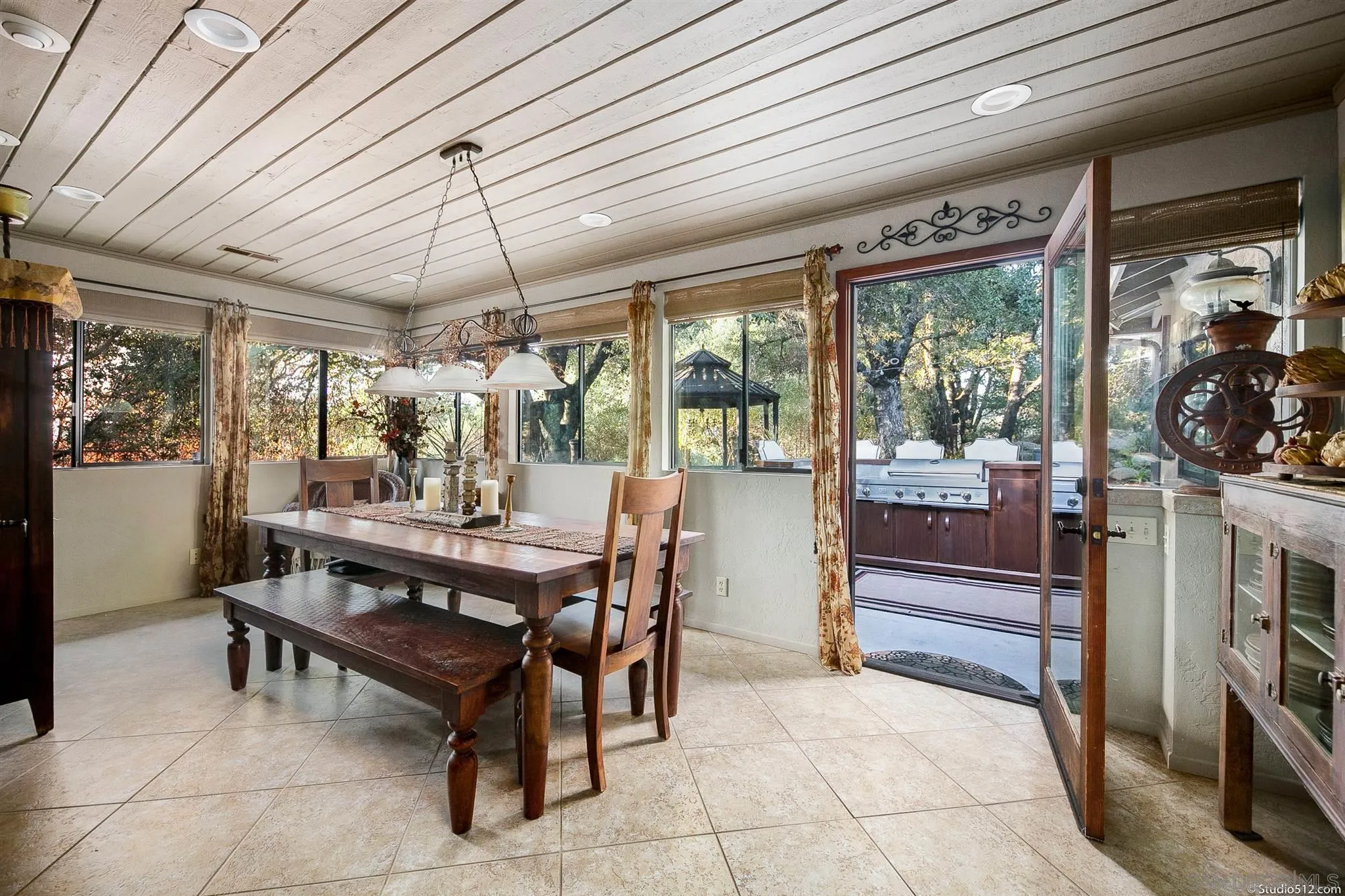 4944 Mountainbrook Road Santa Ysabel, CA 92070 - Photo 13 of 29 a view of a dining room with furniture wooden floor and chandelier