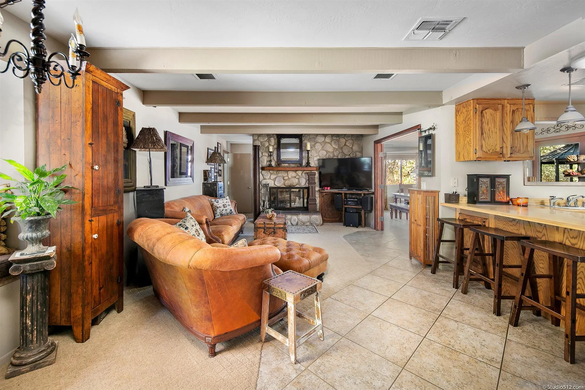 4944 Mountainbrook Road Santa Ysabel, CA 92070 - Photo 14 of 29 a living room with lots of furniture and kitchen view