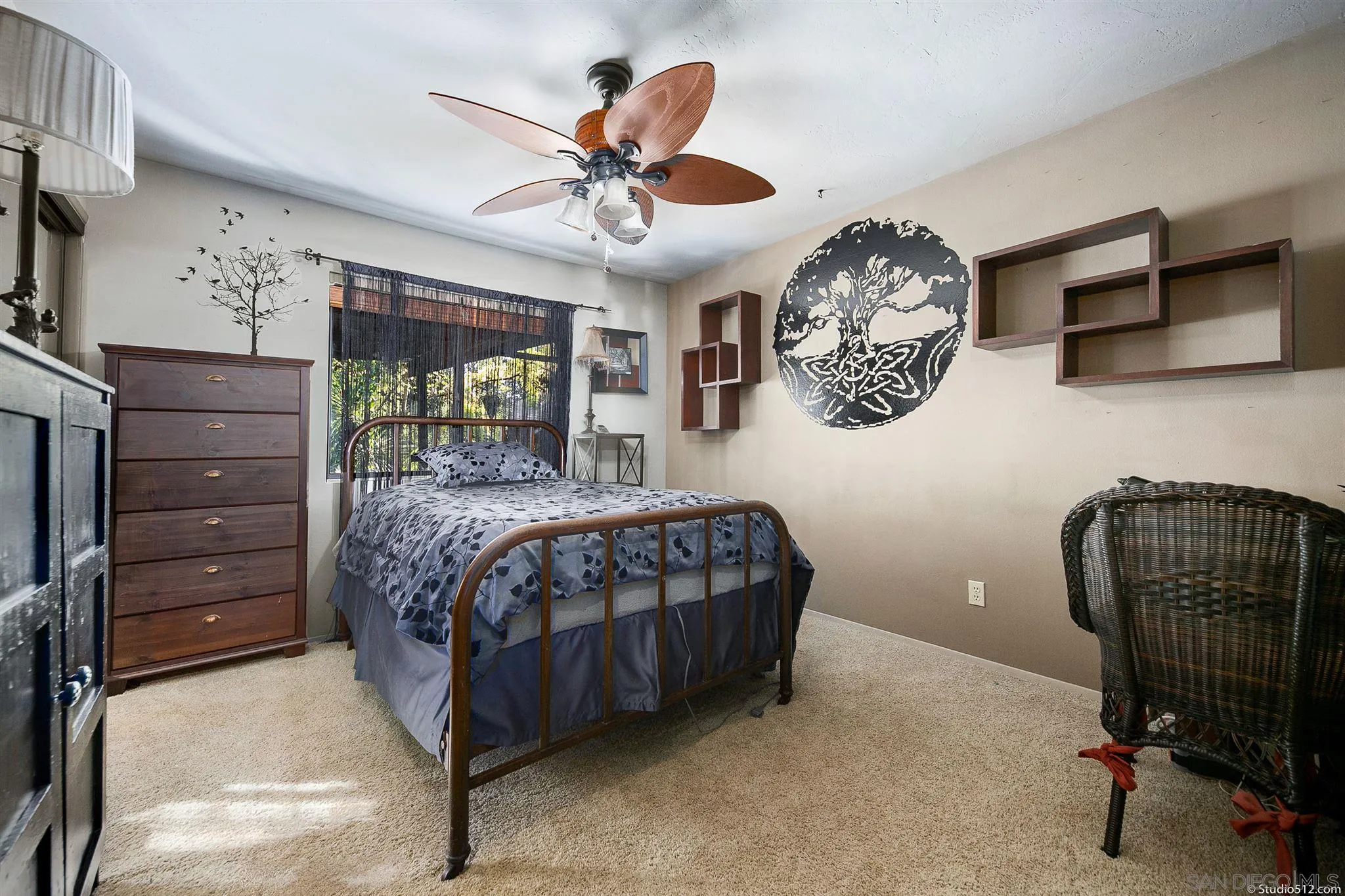 4944 Mountainbrook Road Santa Ysabel, CA 92070 - Photo 20 of 29 a bedroom with a bed a chandelier and a chair