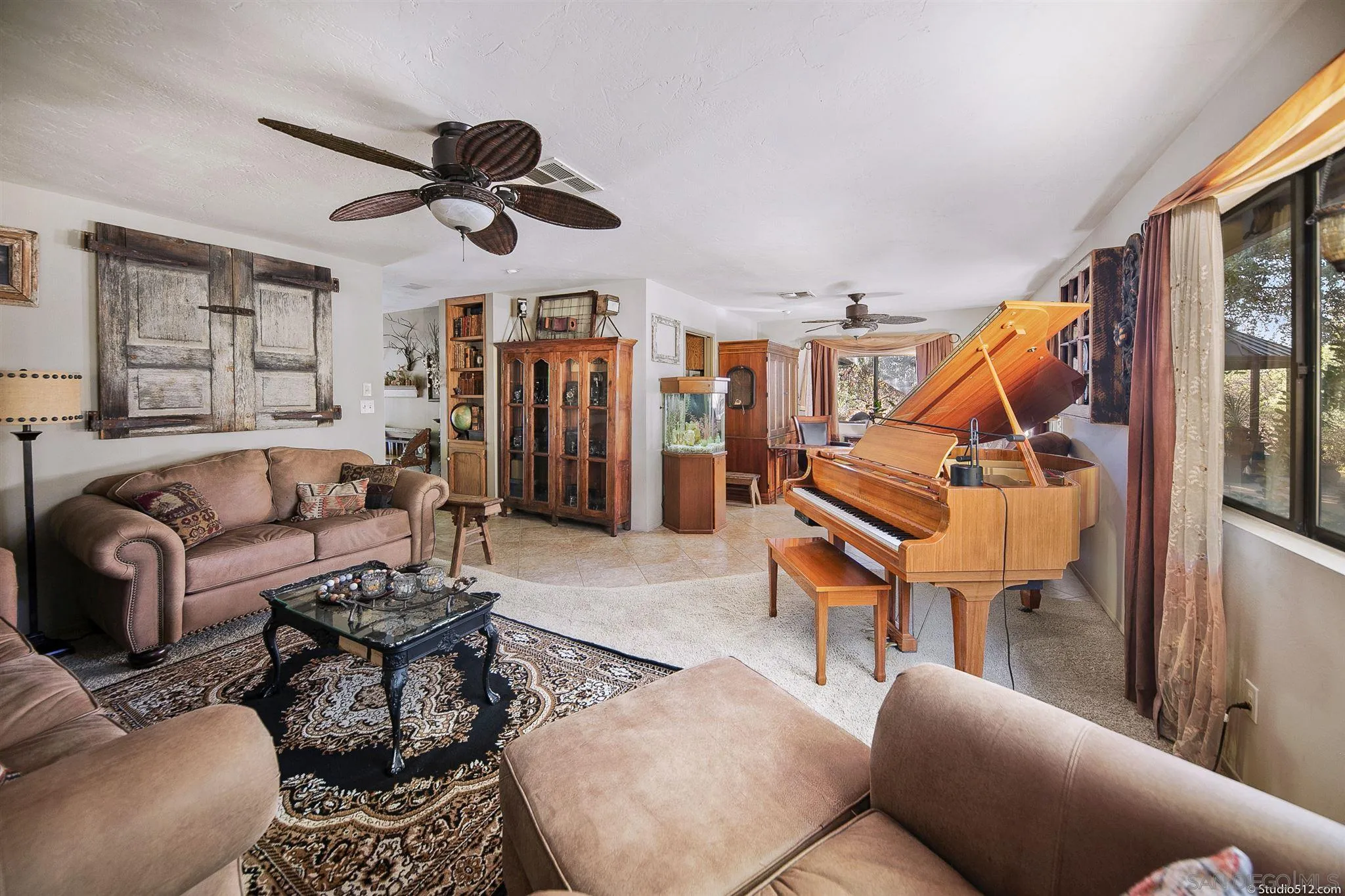 4944 Mountainbrook Road Santa Ysabel, CA 92070 - Photo 9 of 29 a living room with furniture a ceiling fan and a rug