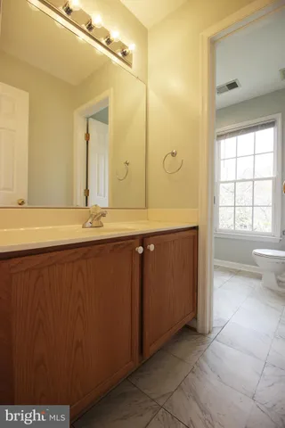 a white bath tub sitting next to a window
