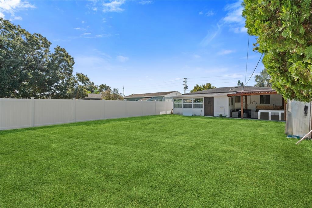4635 22nd Avenue North St. Petersburg, FL 33713 - Photo 18 of 20 a view of a house with backyard and garden