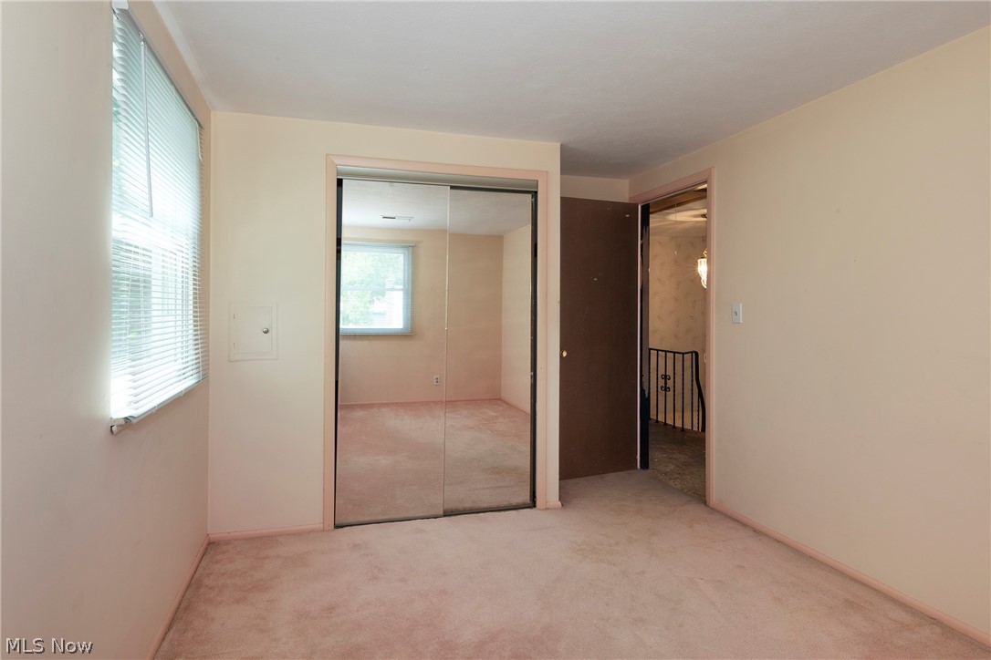 6484 State Road Parma, OH 44134 - Photo 25 of 36 Second bedroom with carpeting and ample closet space.